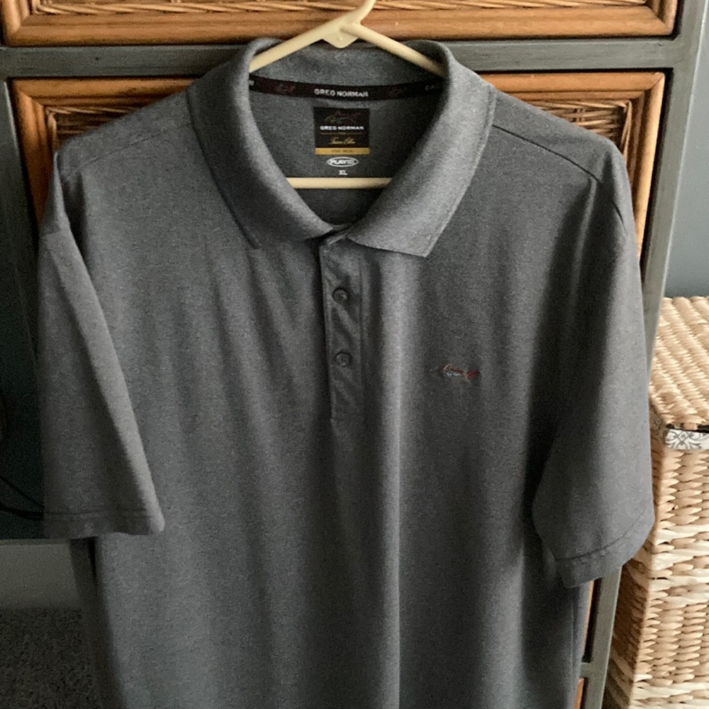Greg Norman golf shirt.